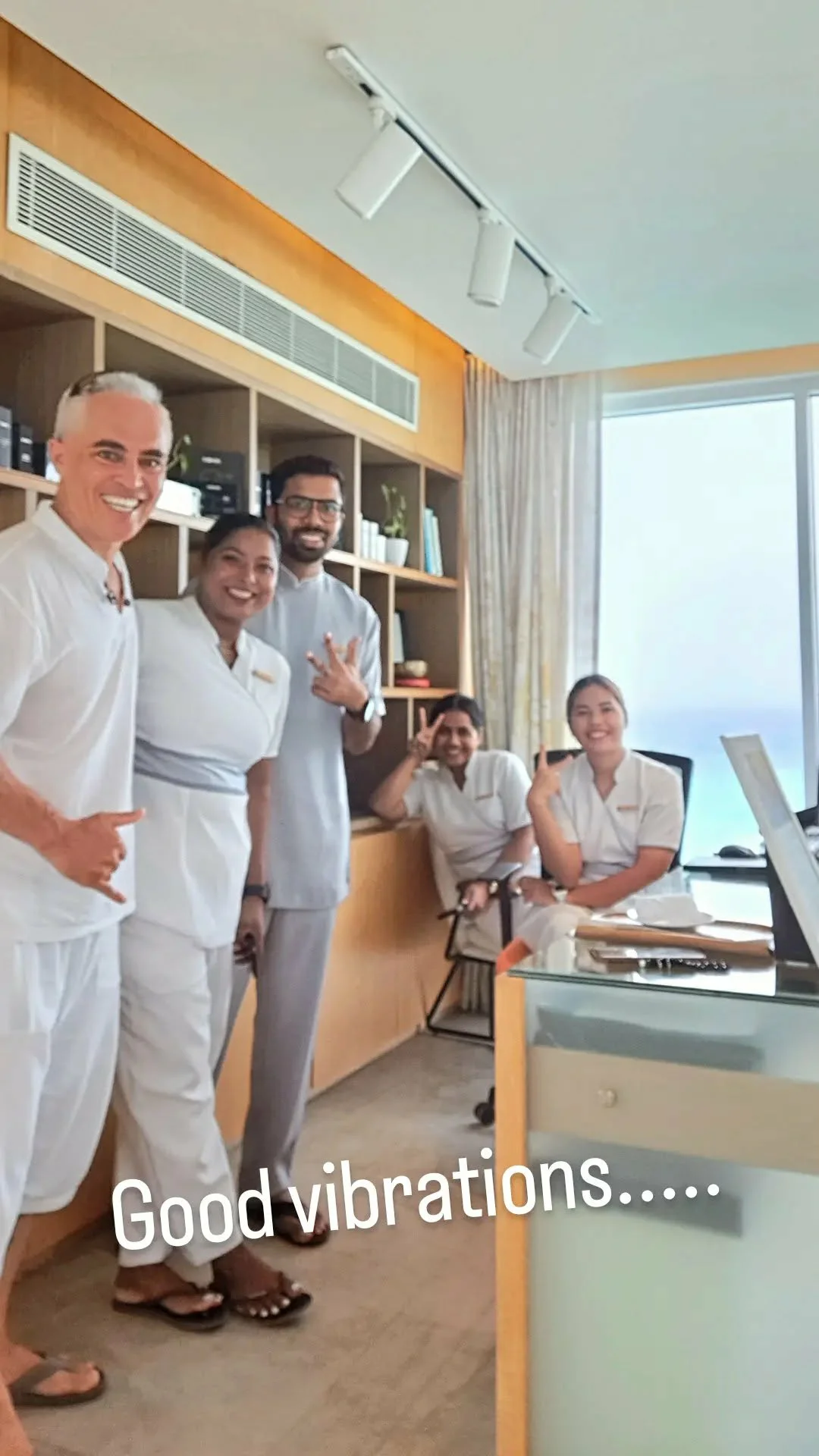 Karol Krauser with the spa and wellness team at a five-star luxury resort in the Maldives