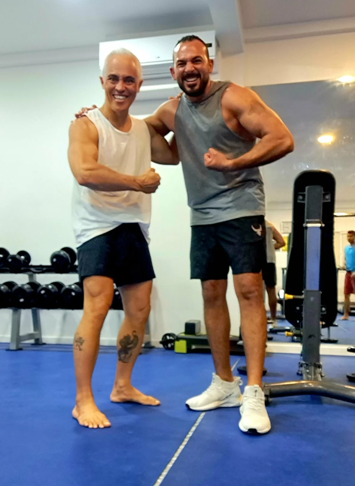 Karol Krauser personal training session with client in luxury resort gym Maldives