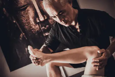 Karol Krauser sports massage therapy for leg and knee rehabilitation